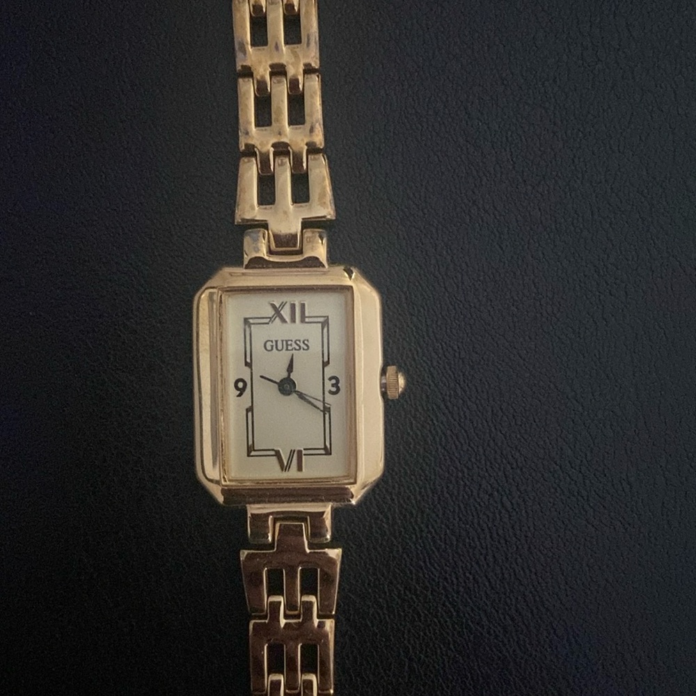 Gold women’s Guess watch